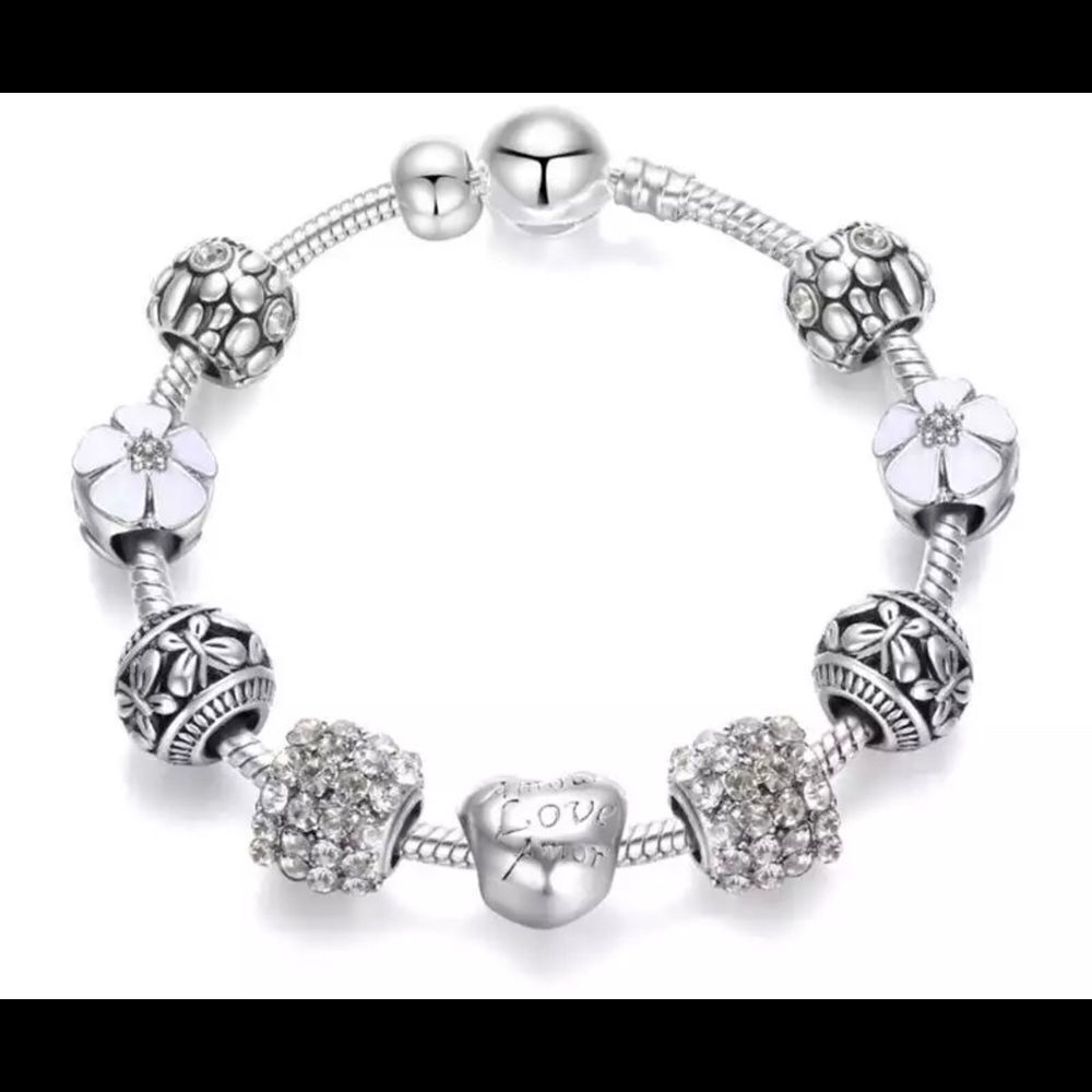 TRENDY WHITE 9 PIECE CHARM BRACELET‎